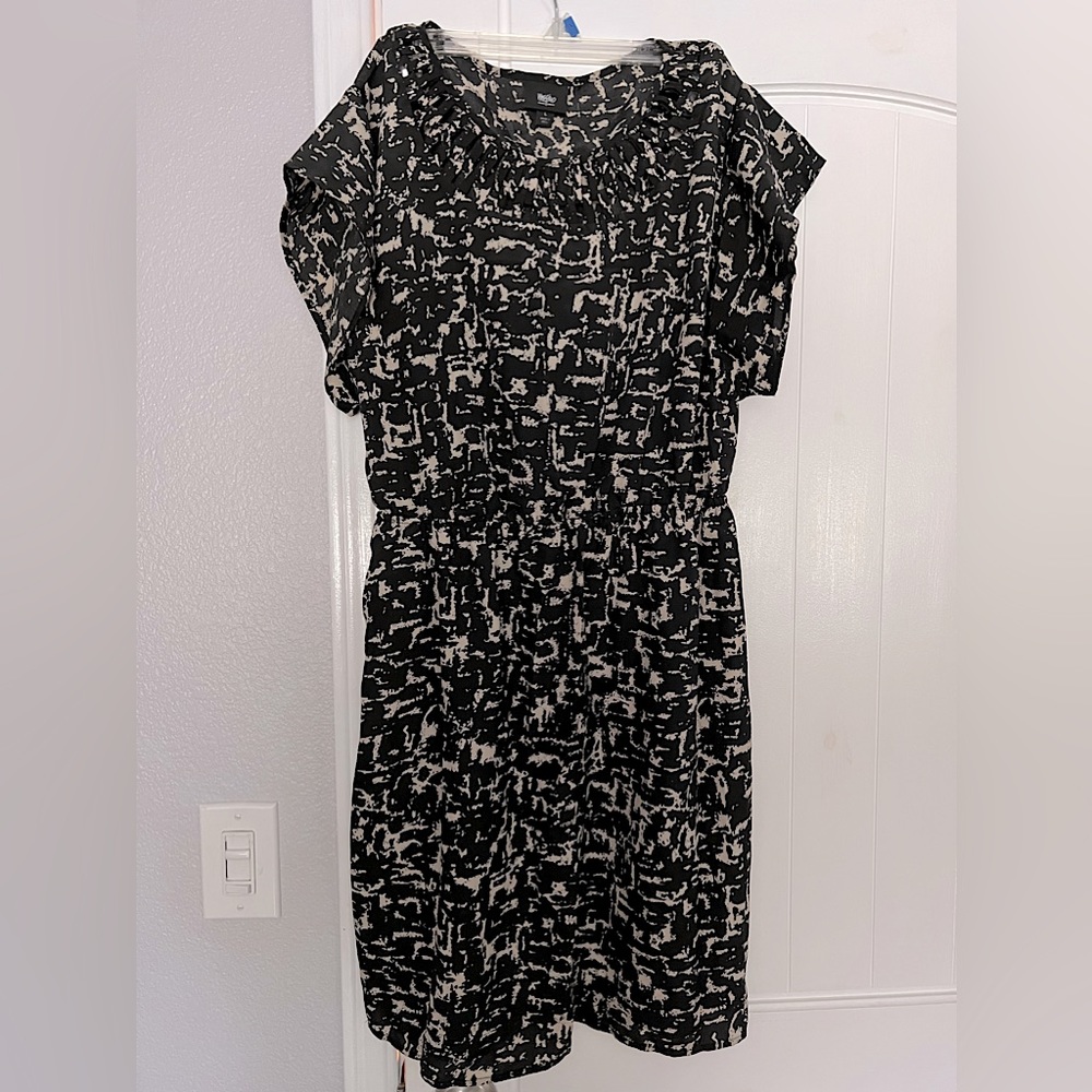 Light knee length dark pattern dress